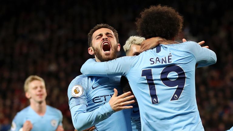 Bernardo Silva celebrates with goalscorer Leroy Sane as Manchester City take a 2-0 lead