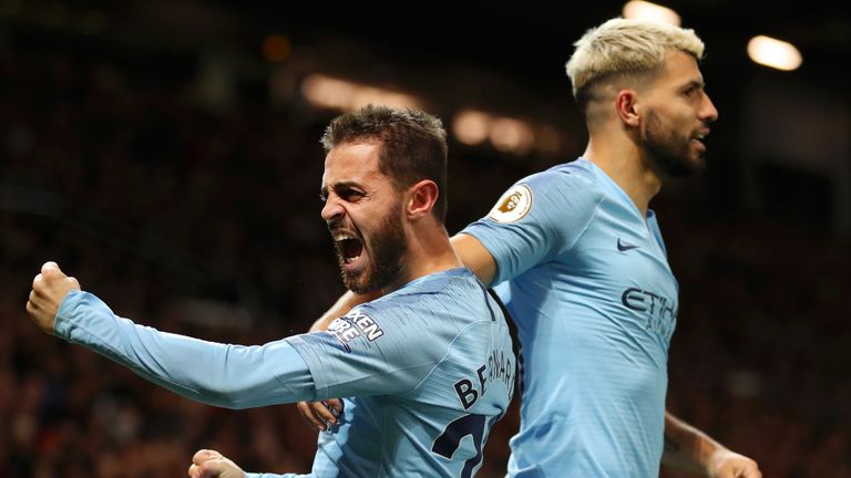 Bernardo Silva celebrates his goal with Sergio Aguero