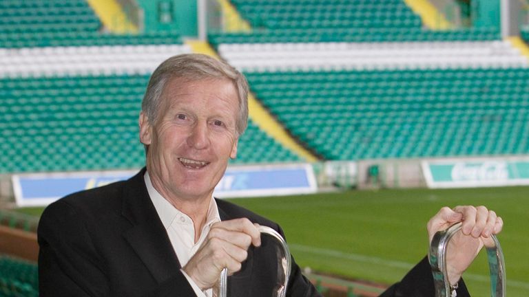 30/10/06.CELTIC PARK - GLASGOW.Lisbon Lions captain Billy McNeill holds the trophy he helped win in 1967 as he and some former team-mates prepare to fly out to Benfica for Celtic's Champions League tie