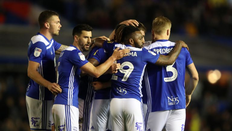 Birmingham City's Michael Morrison (obscured) is mobbed by team-mates after scoring against Sheffield United