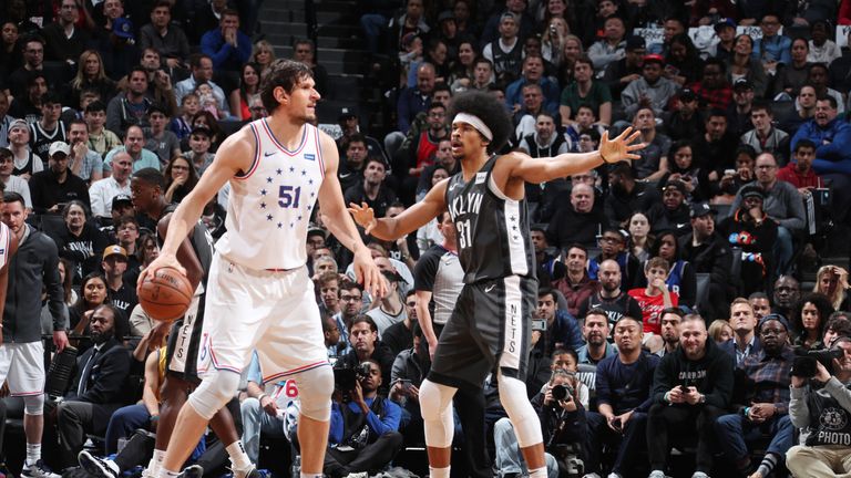 Boban Marjanovic #51 of the Philadelphia 76ers handles the ball against Jarrett Allen #31 of the Brooklyn Nets during Game Four of Round One of the 2019 NBA Playoffs on April 20, 2019 at Barclays Center in Brooklyn, New York.