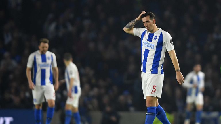 Lewis Dunk of Brighton & Hove Albion cuts a dejected figure during the Premier League match between Brighton & Hove Albion and Cardiff City 