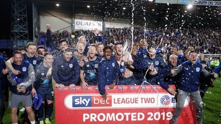 Bury players celebrate promotion