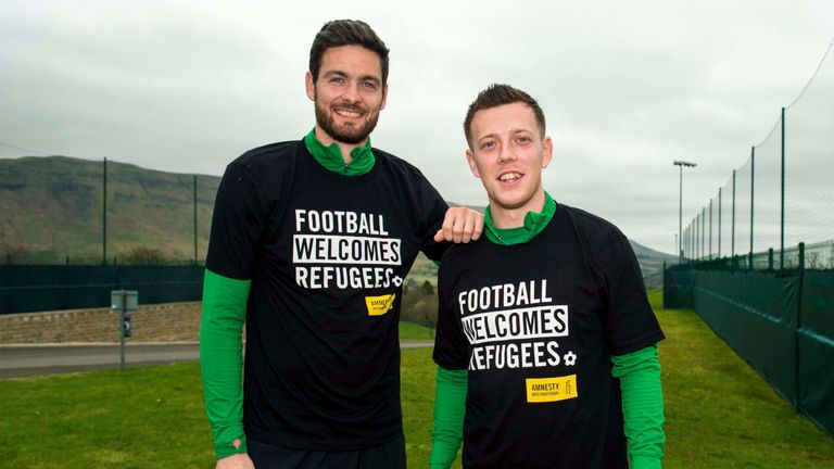 Celtic's Callum McGregor and Craig Gordon (left) show their support for 'Football Welcomes Refugees' initiative in 2018