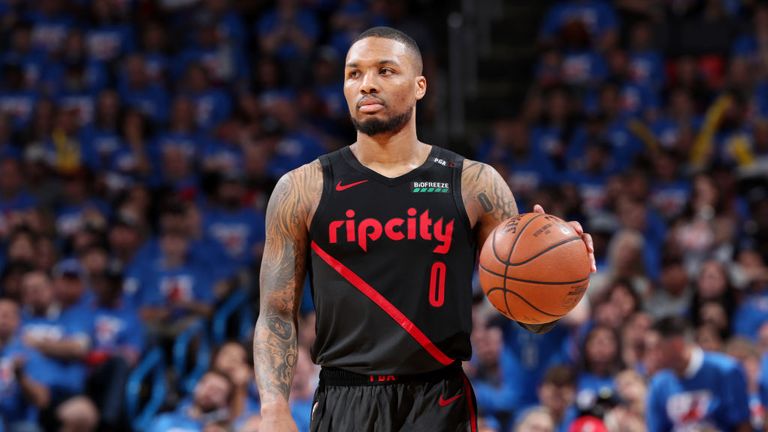 Damian Lillard of the Portland Trail Blazers handles the ball against the Oklahoma City Thunder during Game Four of Round One of the 2019 NBA Playoffs