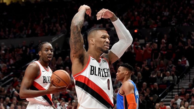 Damian Lillard #0 of the Portland Trail Blazers reacts during play against the Oklahoma City Thunder in the first quarter at Moda Center on April 14, 2019 in Portland, Oregon.