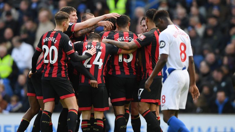 Dan Gosling (obscured) is congratulated by team-mates after giving Bournemouth a 1-0 lead against Brighton