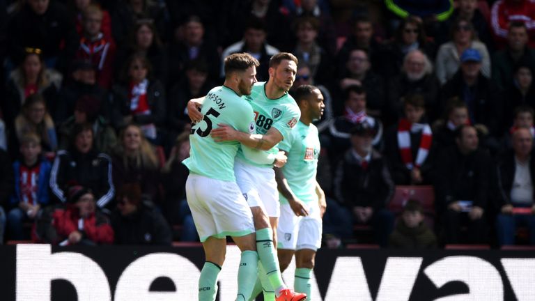 Dan Gosling celebrates his goal with team-mate Jack Simpson