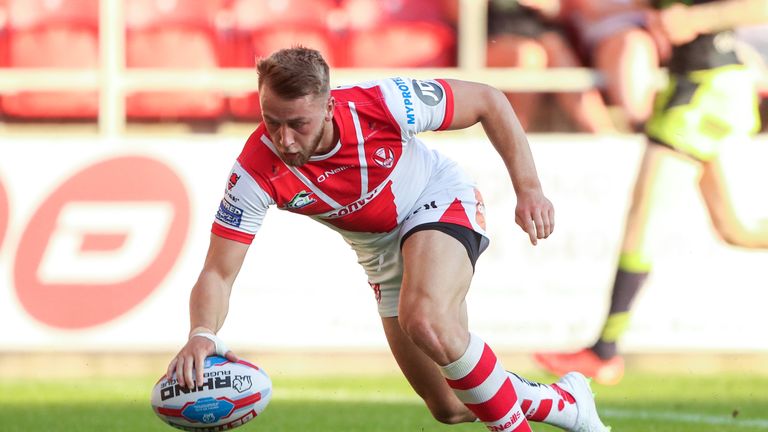 St Helens' Danny Richardson scores a try