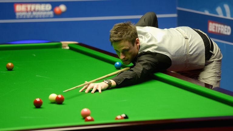 David Gilbert plays a shot against Ronnie O'Sullivan during their first round match of the 2016 Betfred World Snooker Championship at Crucible Theatre on April 17, 2016 in Sheffield, England.