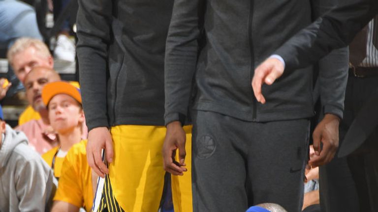 DeMarcus Cousins on the ground during the Warriors&#39; clash with Clippers 