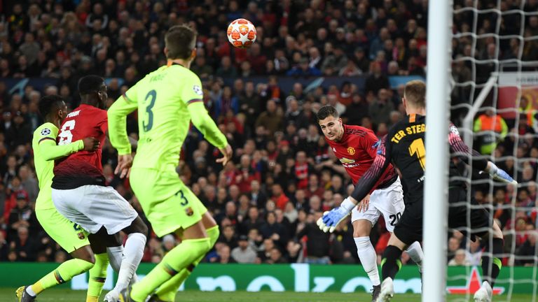 Diogo Dalot heads his glorious chance wide of the Barcelona goal