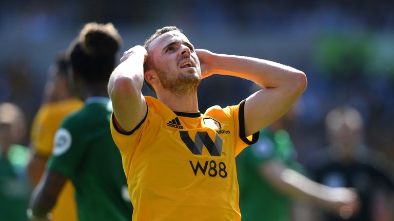Diogo Jota reacts after shooting wide