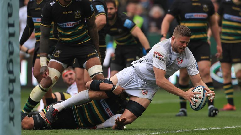 Ed Slater dives over for a try