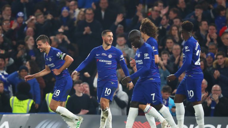 LONDON, ENGLAND - APRIL 08: Eden Hazard of Chelsea (10) celebrates with team mates as he scores his team's first goal during the Premier League match between Chelsea FC and West Ham United at Stamford Bridge on April 08, 2019 in London, United Kingdom. (Photo by Julian Finney/Getty Images)