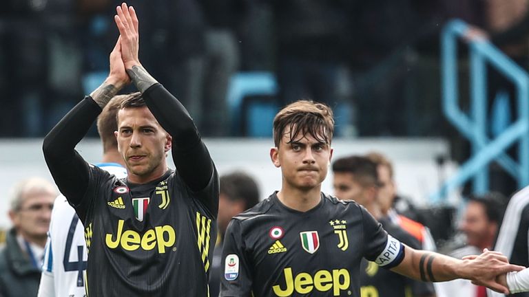 Paulo Dybala and Federico Bernardeschi applaud Juventus fans after the defeat