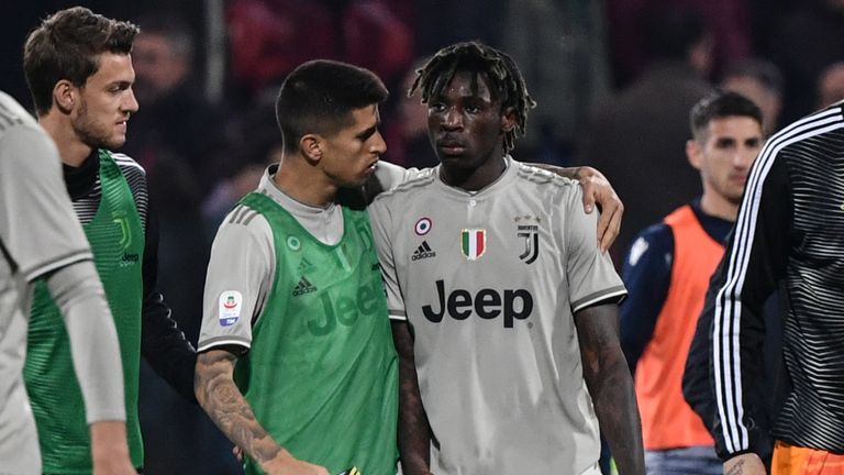 Joao Cancelo comforts Moise Kean after he was racially abused during Juventus' game at Cagliari