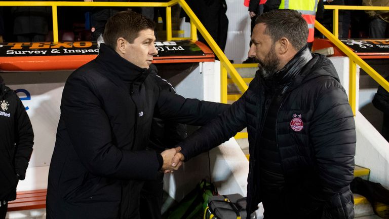 Rangers manager Steven Gerrard shakes hands with Aberdeen manager Derek McInnes