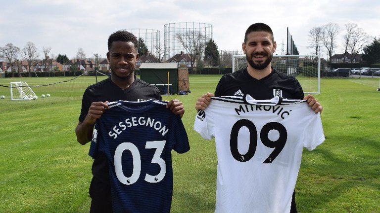 Alexander Mitrovic and Ryan Sessegnon hold their double digit Fulham shirts