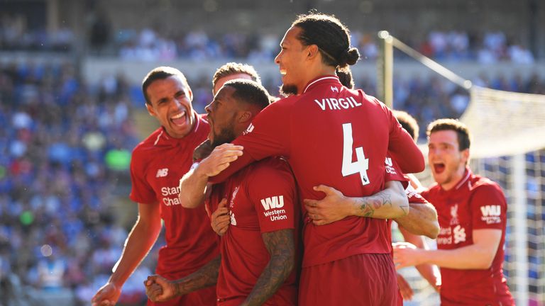 Georginio Wijnaldum celebrates scoring against Cardiff