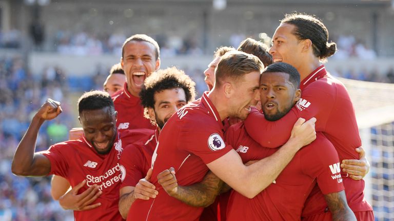 Georginio Wijnaldum celebrates after scoring for Liverpool against Cardiff