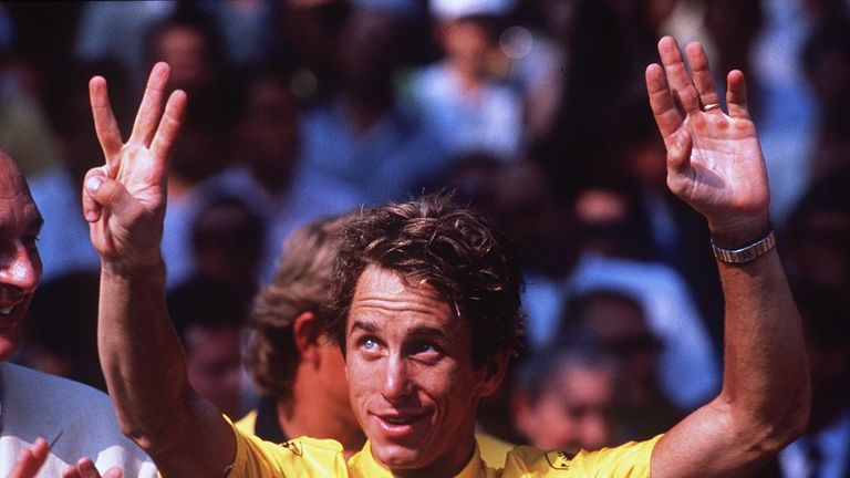 Greg LeMond celebrates after winning the Tour de France in 1990