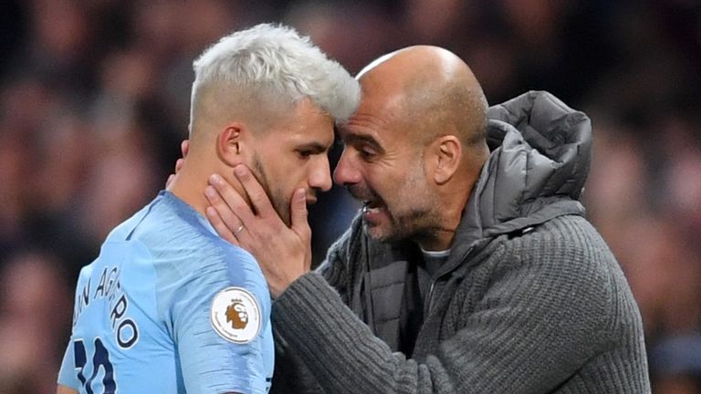 Sergio Aguero of Manchester City is embraced by Josep Guardiola, Manager of Manchester City as he is substituted during the Premier League match between Manchester City and Manchester United at Etihad Stadium on November 11, 2018 in Manchester, United Kingdom