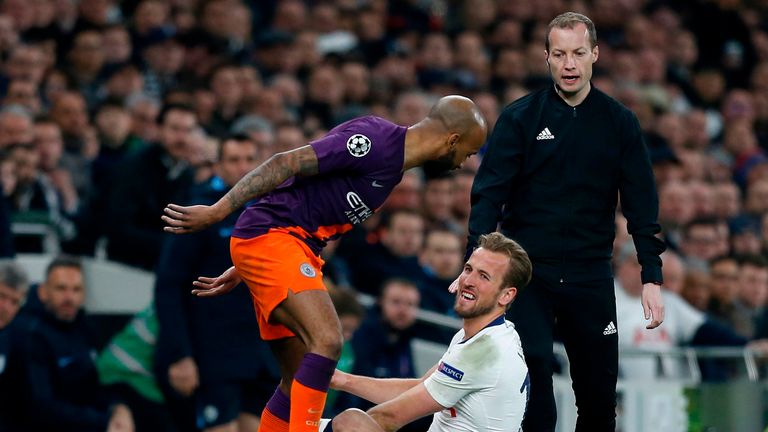 Fabian Delph (L) remonstrates with Harry Kane before the Spurs striker left the pitch with an ankle injury