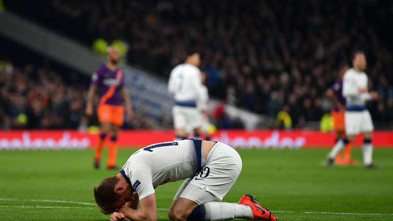 Tottenham's Harry Kane goes down injured during the Champions League clash against Manchester City.