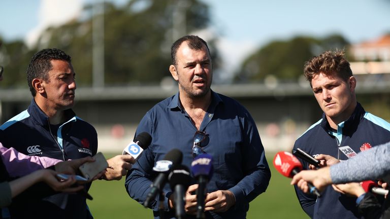 Waratahs coach Daryl Gibson (L), Wallabies coach Michael Cheika (C) and Waratahs captain Michael Hooper (R) spoke to reporters about Israel Folau