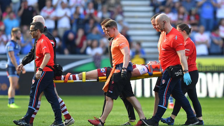 Jake Shorrocks is stretchered off the pitch 