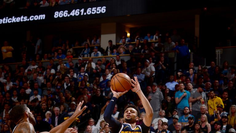 Jamal Murray #27 of the Denver Nuggets shoots the ball against the San Antonio Spurs during Game Seven of Round One of the 2019 NBA Playoffs on April 27, 2019 at the Pepsi Center in Denver, Colorado