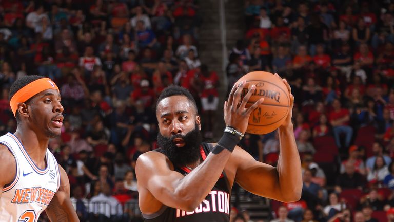 James Harden #13 of the Houston Rockets drives through the paint during the game against Damyean Dotson #21 of the New York Knicks on April 5, 2019 at the Toyota Center in Houston, Texas.