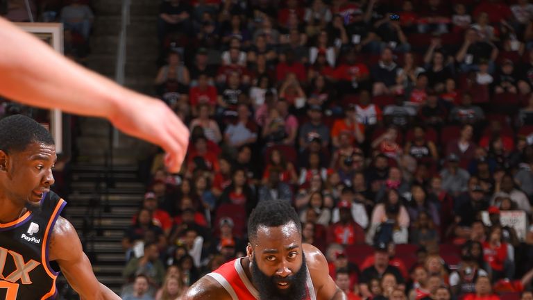 James Harden #13 of the Houston Rockets handles the ball against the Phoenix Suns on April 7, 2019 at the Toyota Center in Houston, Texas.