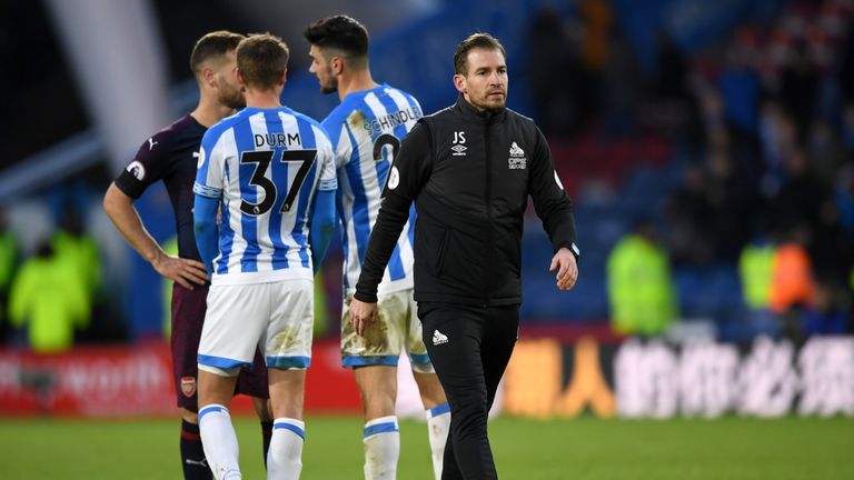 HUDDERSFIELD, ENGLAND - FEBRUARY 09: Jan Siewert, Manager of Huddersfield Town walks off the pitch after the Premier League match between Huddersfield Town and Arsenal FC at John Smith's Stadium on February 9, 2019 in Huddersfield, United Kingdom. (Photo by Gareth Copley/Getty Images)