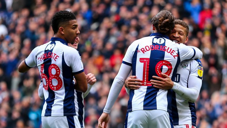 Jay Rodriguez celebrates with strike partner Dwight Gayle after making it 3-0