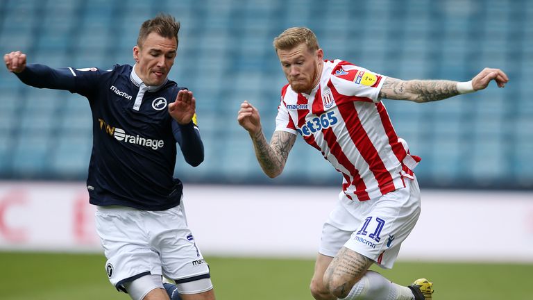 Millwall's Jed Wallace and Stoke City's James McClean battle for the ball