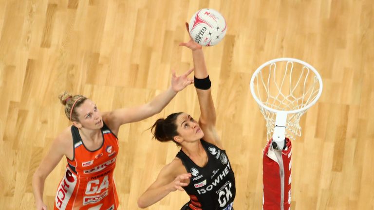 Jo Harten of the Giants and Sharni Layton of the Magpies compete for the ball  during the round 13 Super Rugby match between the Magpies and the Giants at Hisense Arena on July 29, 2018 in Melbourne, Australia. 