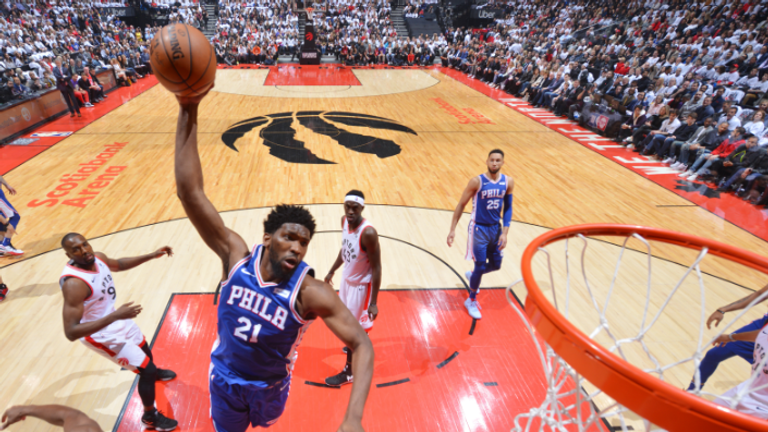  Joel Embiid #21 of the Philadelphia 76ers dunks the ball against the Toronto Raptors during Game One of the Eastern Conference Semi-Finals of the 2019 NBA Playoffs on April 27, 2019 at the Scotiabank Arena in Toronto, Ontario, Canada