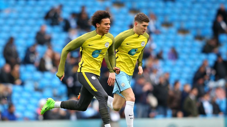 Leroy Sane of Manchester City and John Stones of Manchester City warm up during the Premier League match between Manchester City and Swansea City at Etihad Stadium on February 5, 2017 in Manchester, England. 