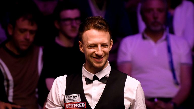 Judd Trump looks on against Thepchaiya Un-Nooh in the opening round of the world snooker championship at Crucible Theatre on April 23, 2019 in Sheffield, England