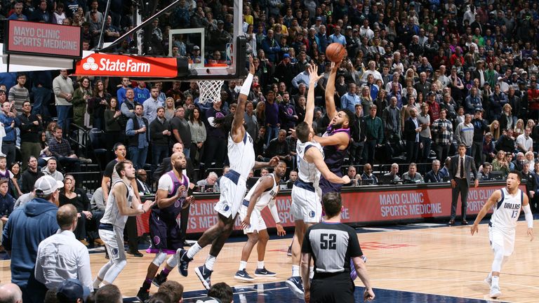 Karl-Anthony Towns of the Minnesota Timberwolves shoots the ball against the Dallas Mavericks