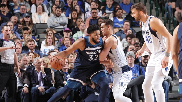 Karl-Anthony Towns #32 of the Minnesota Timberwolves jocks for a position during the game against Dwight Powell #7 of the Dallas Mavericks on April 3, 2019 at the American Airlines Center in Dallas, Texas.
