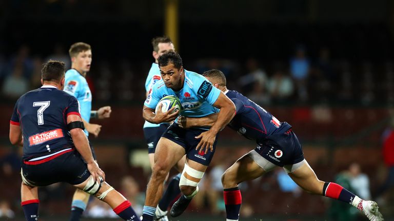 Karmichael Hunt tests the rebels defence