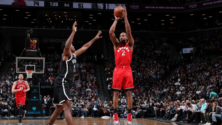 Kawhi Leonard of the Toronto Raptors shoots the ball against the Brooklyn Nets