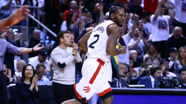 Kawhi Leonard #2 of the Toronto Raptors reacts as he runs down the court during Game One of the second round of the 2019 NBA Playoffs against the Philadelphia 76ers at Scotiabank Arena on April 27, 2019 in Toronto, Canada.