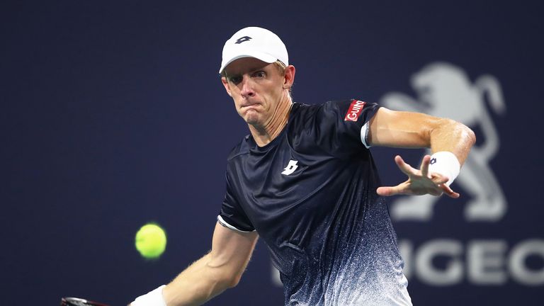 Kevin Anderson of South Africa in action against Roger Federer of Switzerland during day eleven of the Miami Open tennis on March 28, 2019 in Miami Gardens, Florida