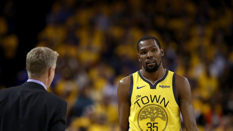 Kevin Durant talks to Warriors head coach Steve Kerr in Game 2 of Round One against the LA Clippers during the 2019 NBA Playoffs