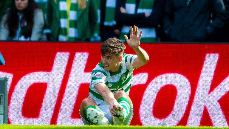 Celtic's Kieran Tierney suffers an injury in the second half against Rangers