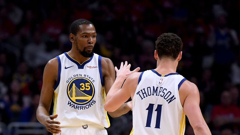  Kevin Durant of the Golden State Warriors celebrates a basket with Klay Thompson during a 113-105 win over the LA Clippers in Game Four of Round One of the 2019 NBA Playoffs